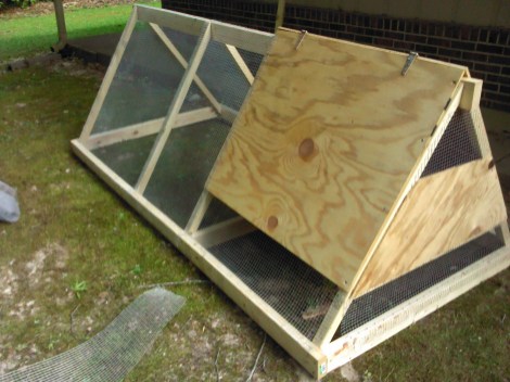 We added the top of the coop, and a lot of the hardware cloth. Still missing the door.